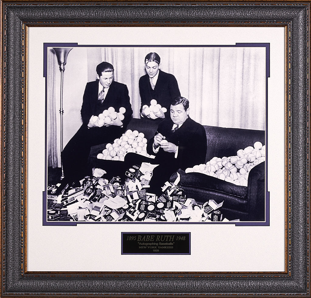Babe Ruth Signing Baseballs – Millionaire Gallery